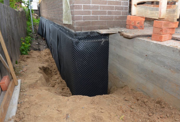 SJ Waterproofing Pros technician performing targeted Emergency Waterproofing assessment in Fayetteville, PA